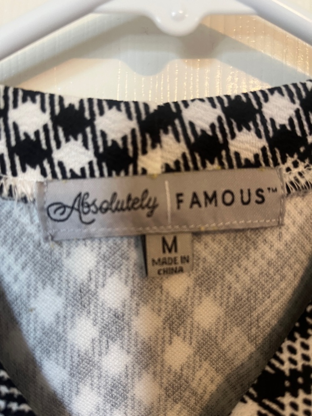 Absolutely Famous Black-and-White Plaid Panel Peplum Blouse - Picture 3 of 3